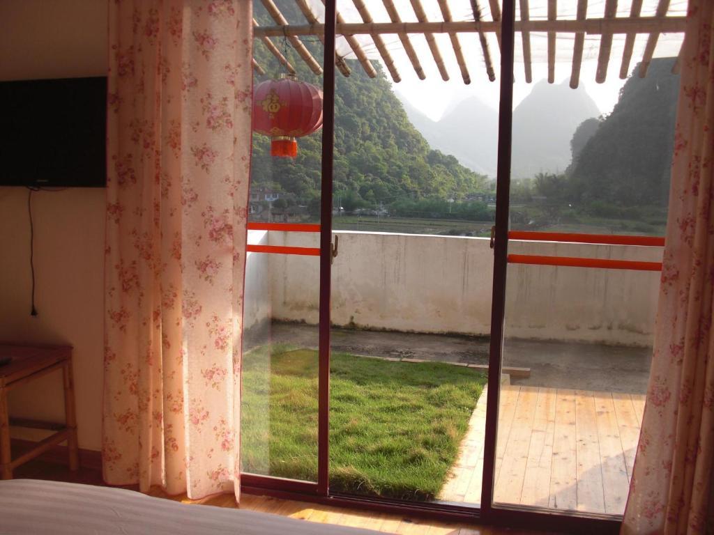 Huanggong Garden Hotel Yangshuo Quarto foto